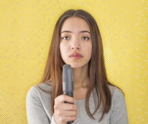 Lone Sign Language Interpreter Holding a Microphone